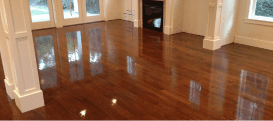 Polished hardwood floors with glossy finish in bright residential interior