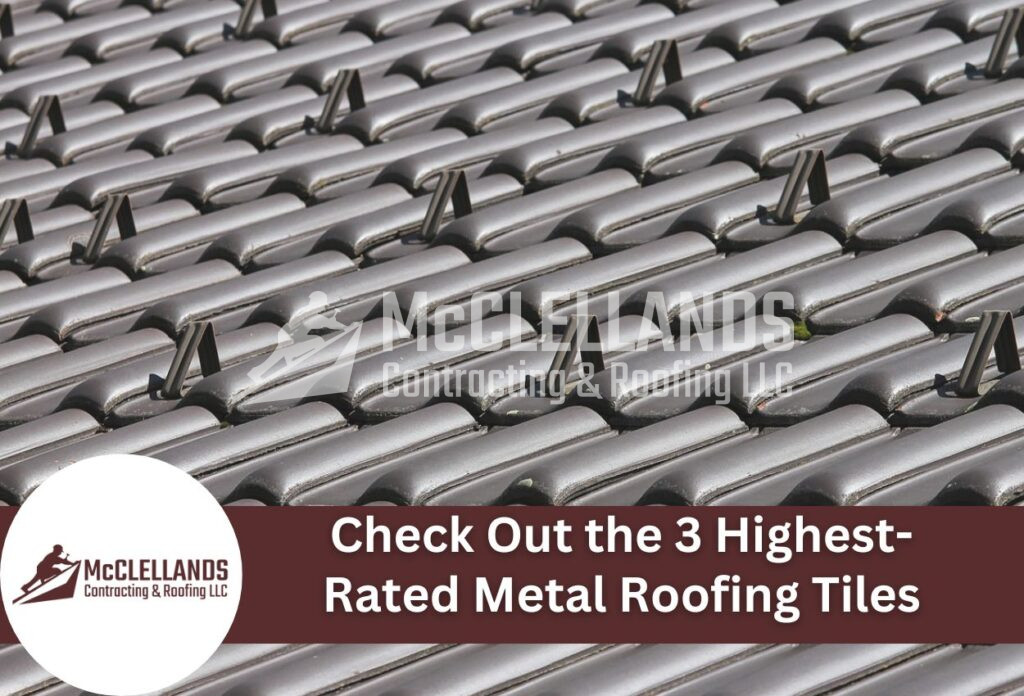 Gray metal roofing tiles with snow guards arranged in rows on residential roof
