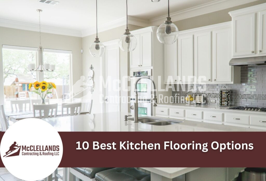 Modern White Kitchen With Island, Pendant Lights, And Subway Tile Backsplash
