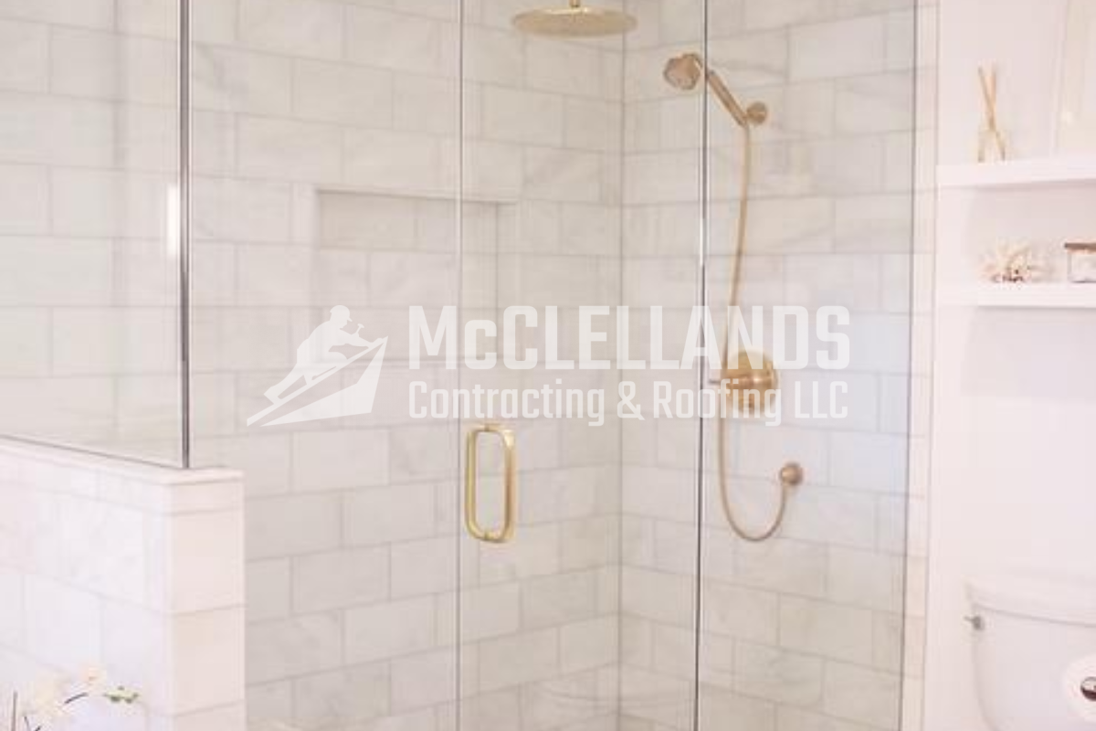 Glass Shower Space With Gold Fixtures