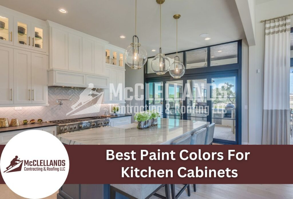 Modern White Kitchen Cabinets With Glass Pendant Lights And Marble Countertops