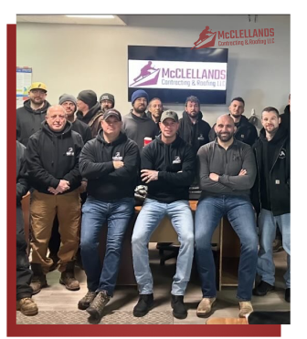 Team of McClellands Contracting & Roofing LLC posing in office.